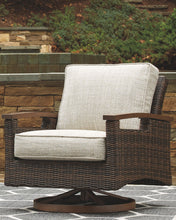 Load image into Gallery viewer, Paradise Trail - Swivel Lounge Chair (Set of 2) - Medium Brown