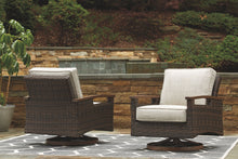 Load image into Gallery viewer, Paradise Trail - Swivel Lounge Chair (Set of 2) - Medium Brown
