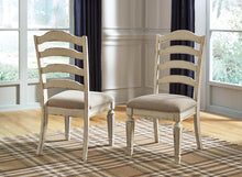Load image into Gallery viewer, Realyn - Dining UPH Side Chair (Set of 2) - Ladderback - Chipped White
